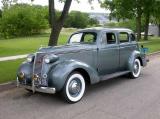At East Dubuque home of car from 1937-71. Miss. Riv. Bridge in background