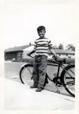 Richard leaning on bicycle, 1950 (402)