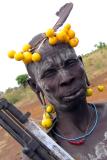 Mursi man with gun