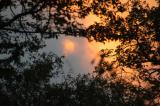 Sunset through the mist over Victoria Falls
