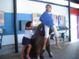 Rachel on piggie, Sarah wants on