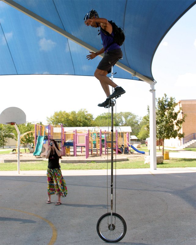 10 foot giraffe unicycle