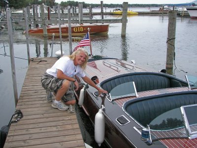Sally Lathrop helping park the boats.