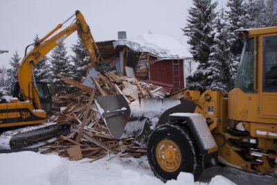 A front loader removes all wood II