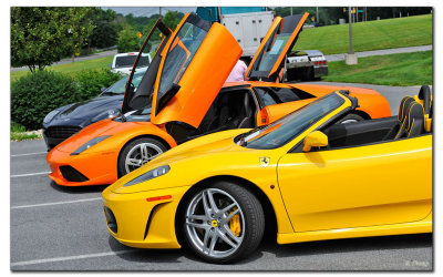 Ferrari, Lamborghini, and a Astom Martin