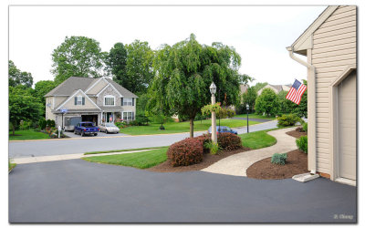 sealed driveway and new light fixture