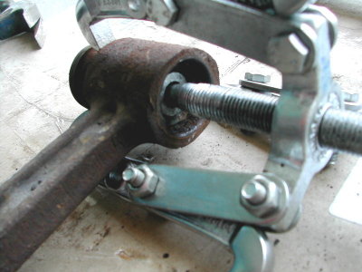 3-jaw puller to remove the bushing