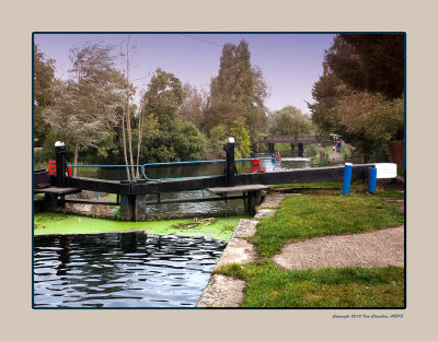 Canal lock gates and wooden footbridge