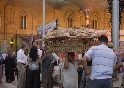 Jan al Jalili selling bread.jpg