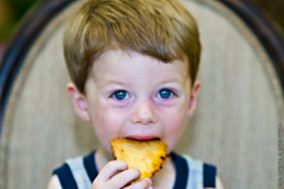 Eli Eating Pizza