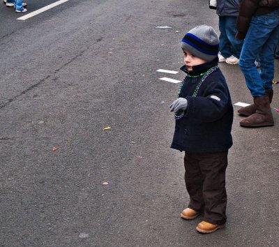 Boy watching parade