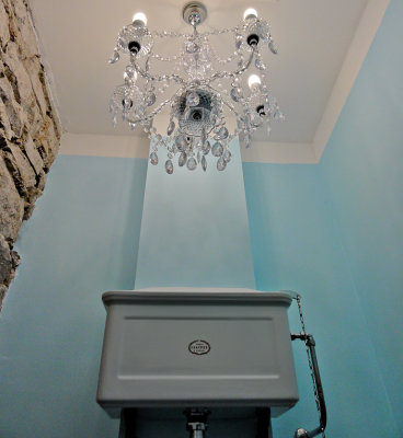 Period style toilet, with chandelier. :)