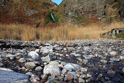 Stream off cliff down to sea at Muchalls
