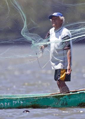 Fisherman Casting a Net