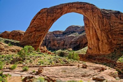 Hiker admiring the arch