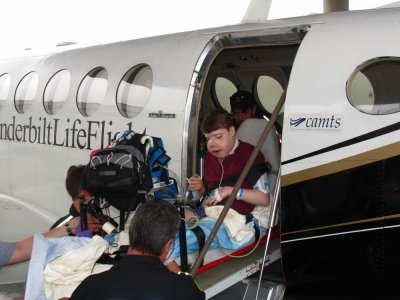 Brian being loaded on the LifeFlight plane...