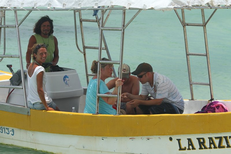 The gang eating ceviche .. fresh fish in lime juice with onions tomatoes .. not cooked!!!