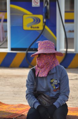 Laotian gas attendant