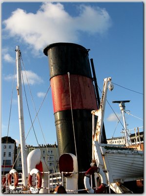 Puff of smoke from the old steam tug?