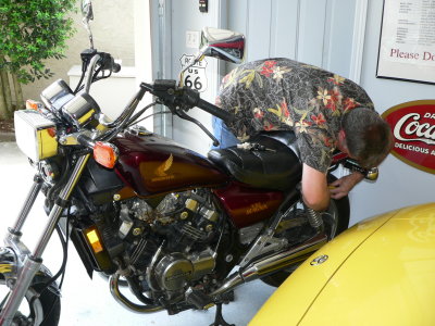 Me cleaning Jace's bike