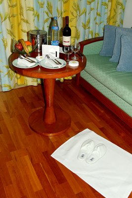 Complimentary fruit, wine and slippers