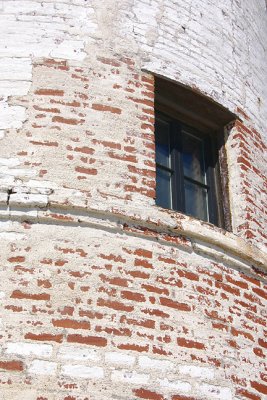Lighthouse brickwork and window.