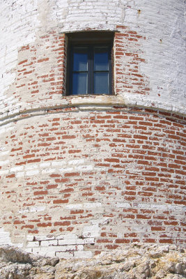 Lighthouse brickwork and window.