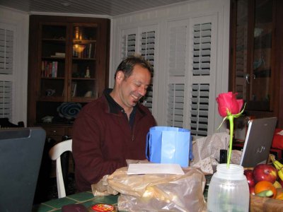 READING HIS BIRTHDAY CARD