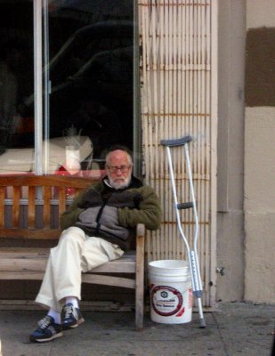 Old man with one crutch