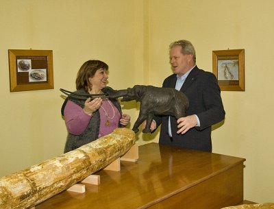 Dick and Evangelia with the Mastodon model and the real Mastodon teeth in the Milia Museum
