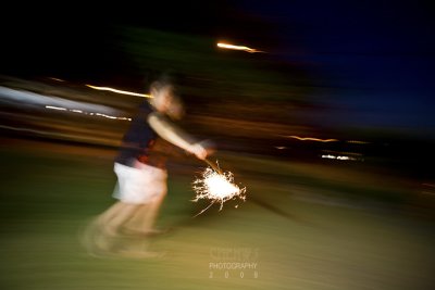 Sparklers and girl in motion