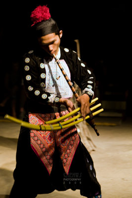 Hmong playing bamboo flute