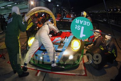 SEPANG, MALAYSIA - AUGUST 08: Team Porsche Club of Singapore's race car stops for refuel and driver change at the Merdeka Millen