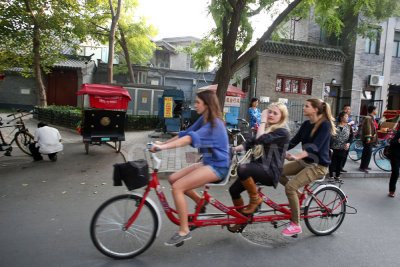 Tourists on a tricycle