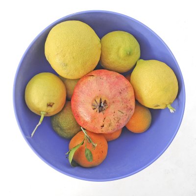 Fruit in purple bowl