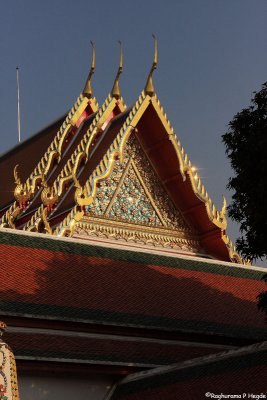 The roof of a temple glistening in the sun
