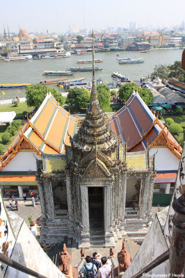 The city as seen down the stairs leading to the top of Wat Arun
