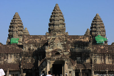 The inner wall with the towers of Angkor as a backdrop