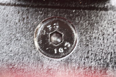 Front spring retaining bolt