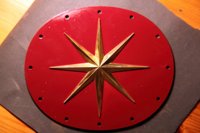Belly tank cover with brass star