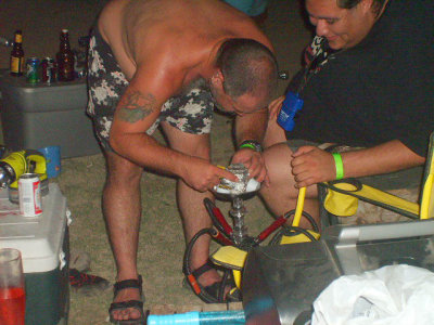 Wolfie setting up the Hooka Slash suggesting he takes it out of the plastic cup before lighting