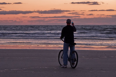 Photographer on a Bike