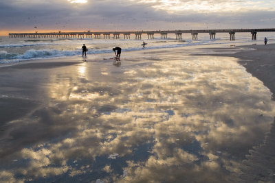 Surfers and Clouds