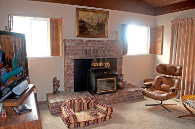 Again.   Murphy's chair is in Front of Fireplace