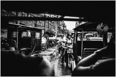 Driving through the monsoon-rain flooded streets in our tuk tuk