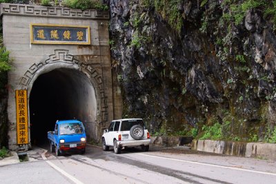 A tunnel that allows only one car to pass
