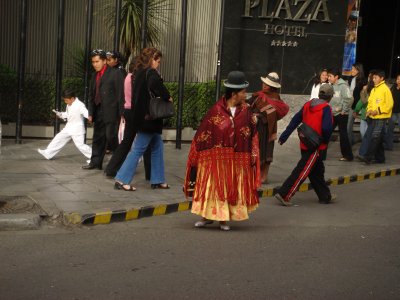 Woman in native dress outside Plaza Hotel