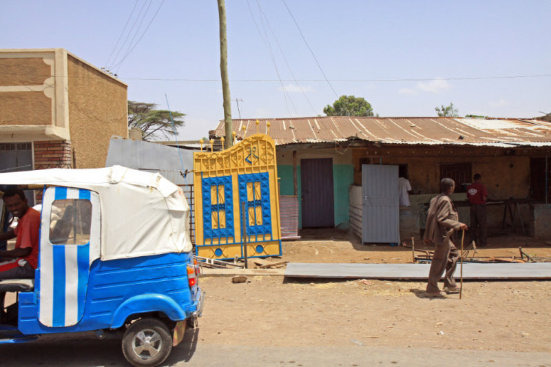 Rickshaw and shop