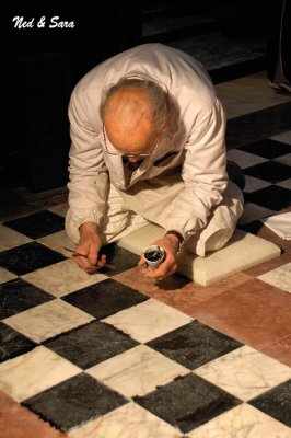 repairing the  floor tiles in the Duomo