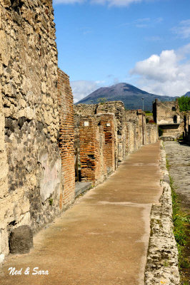 Pompeii street  scene with Mt Vesuvius in background